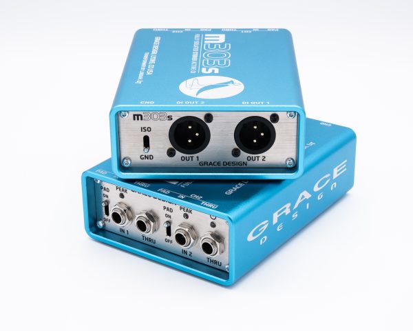 High-performance Grace Design m303s stereo active DI box, featuring dual XLR outputs, input controls, and a vibrant blue casing, designed for professional audio applications in stage and studio settings.