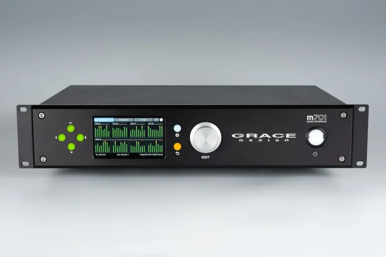Front panel of the Grace Design m701 audio interface featuring a color meter display and rotary edit controller.