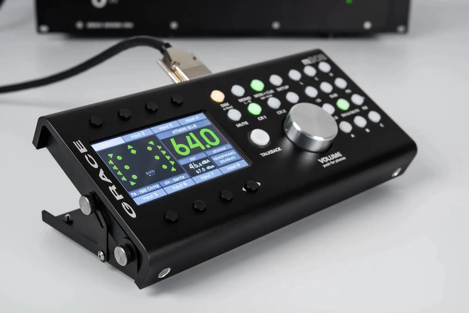 Grace Design m908 monitor controller desktop remote with color display and volume encoder knob.